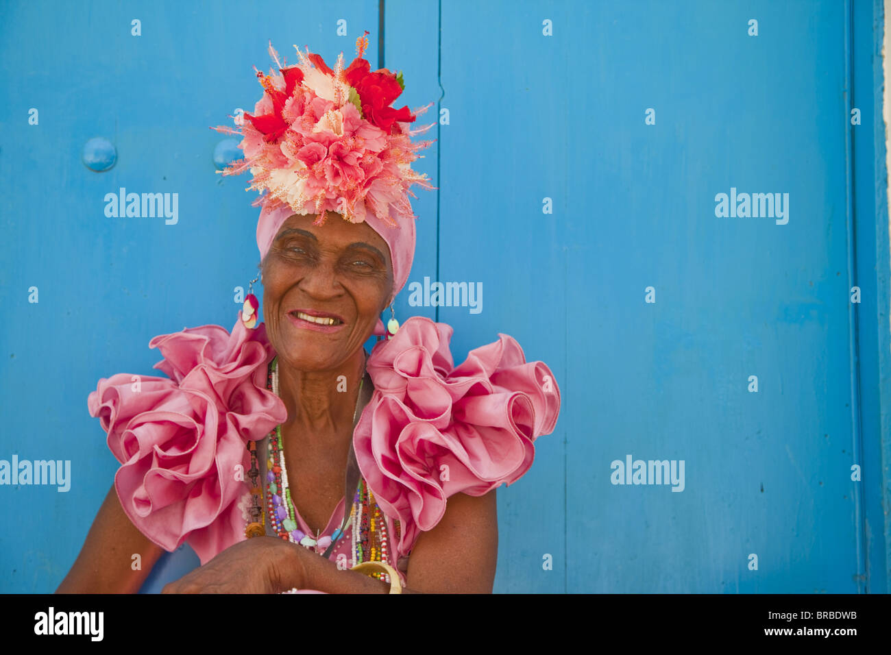 Cuban woman dressed as showgirl, Havana, Cuba, West Indies, Central America Stock Photo