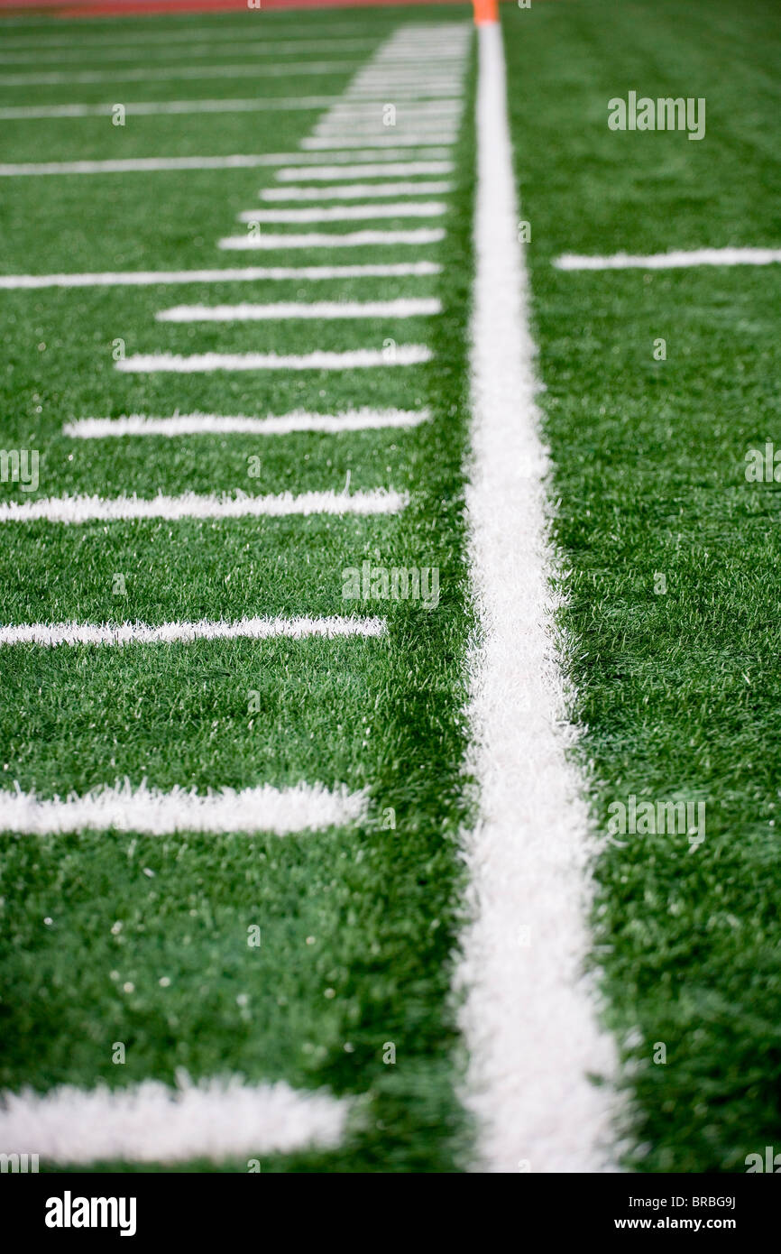 American football field markings on sideline of astro-turf field Stock Photo