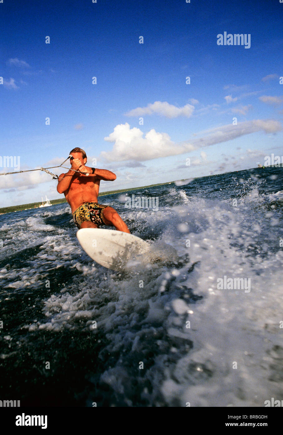 Singleski water surfer behind boat Stock Photo Alamy