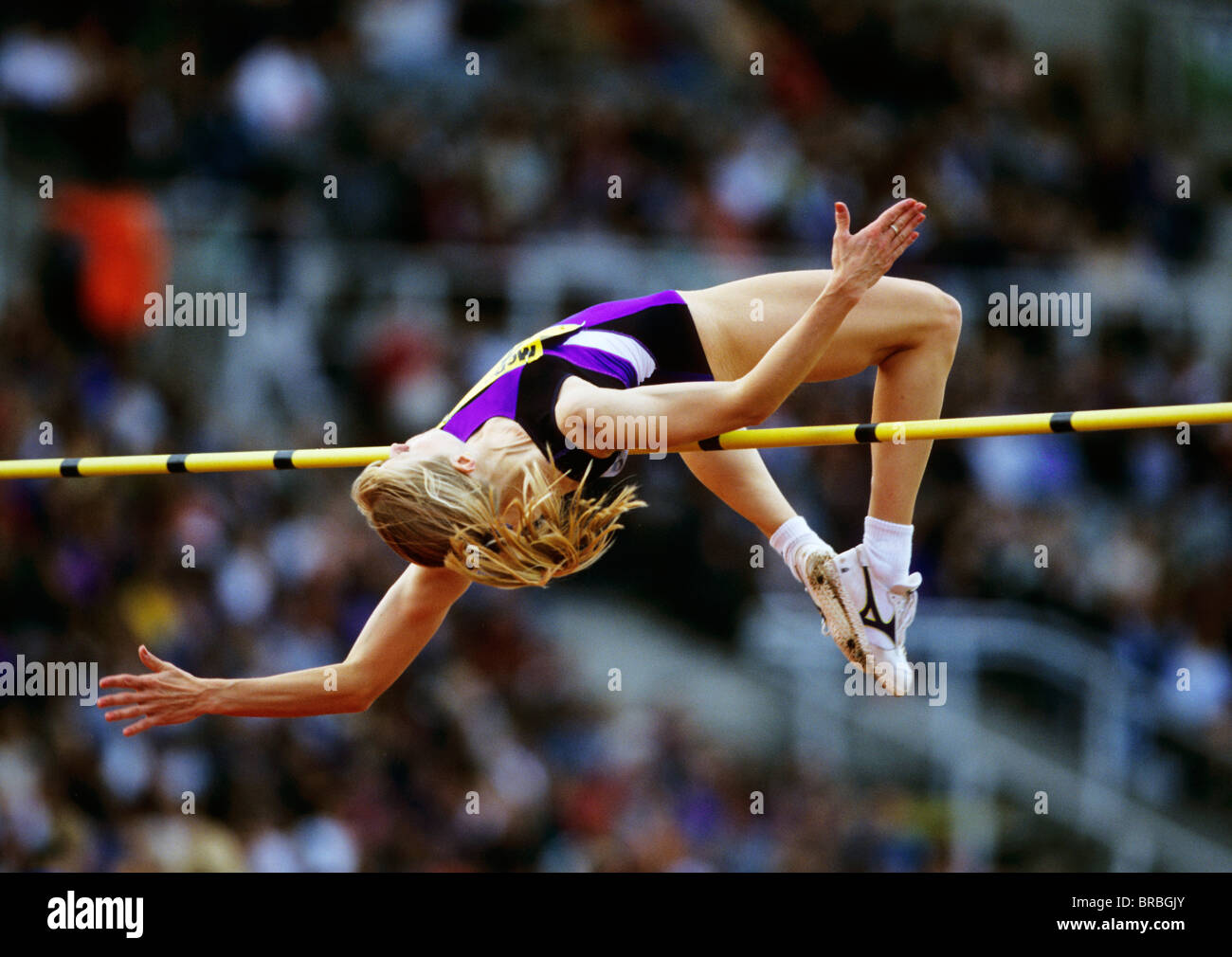 Female highjumper clears bar on her jump Stock Photo Alamy