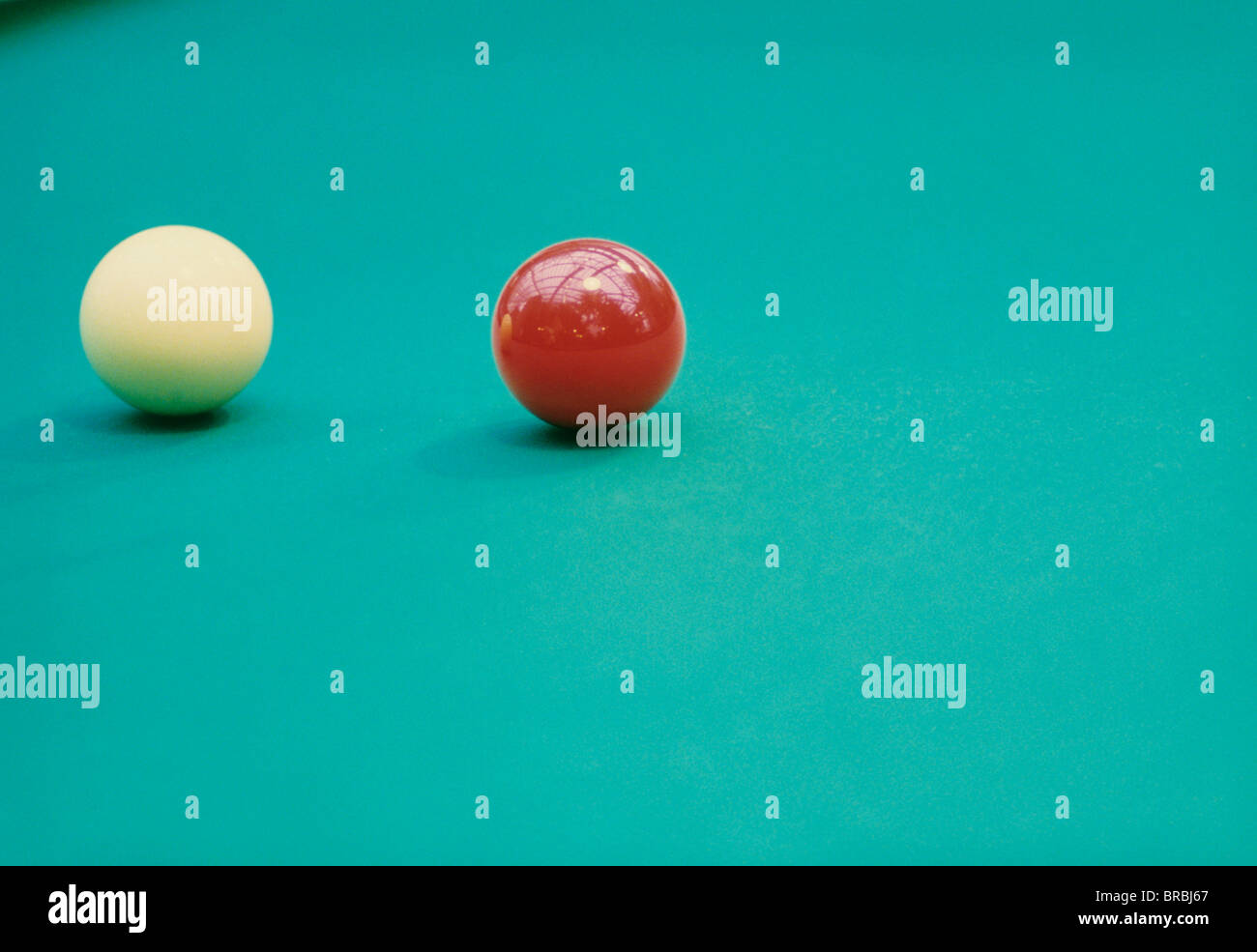 Red and white snooker balls in snooker table Stock Photo