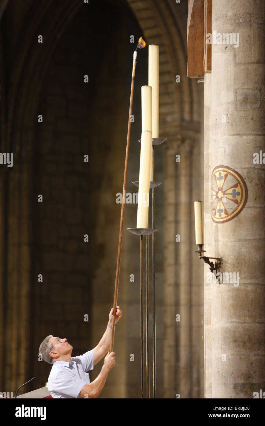 Lighting candles, Notre Dame de Paris Cathedral, Paris, France Stock