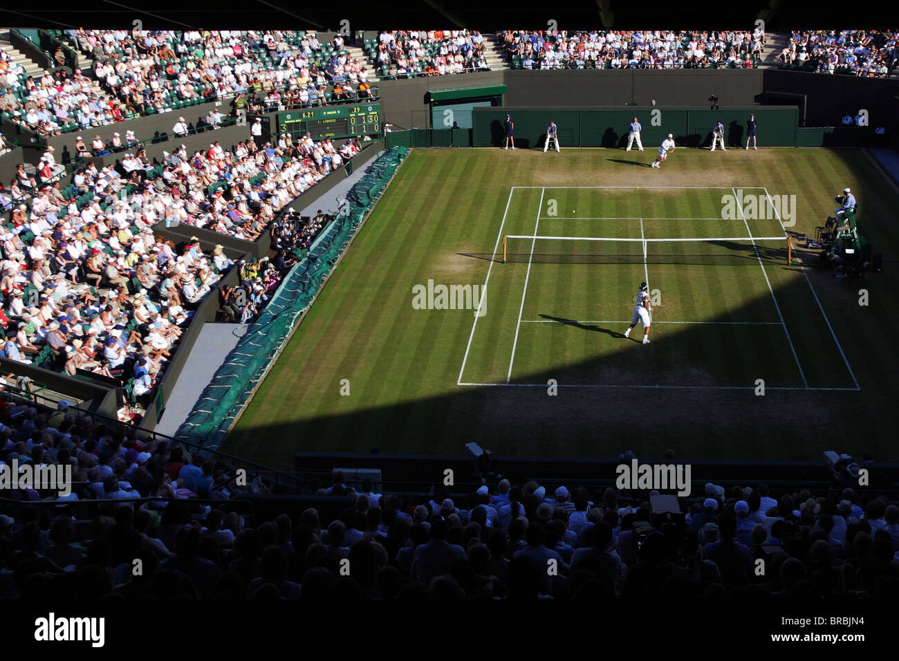 Large crowd watching a tennis match Stock Photo