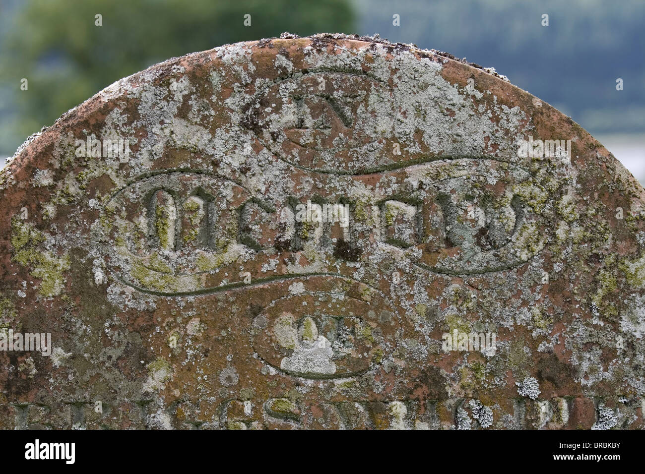 A weathered grave stone showing the words In Memory Stock Photo Alamy
