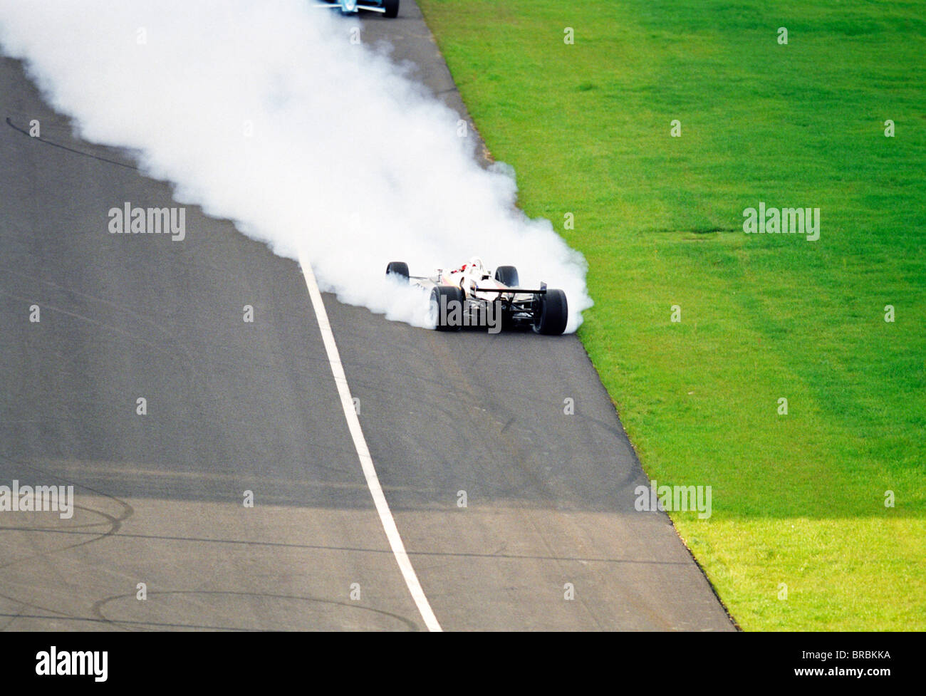 Formula one car spinning out of control Stock Photo