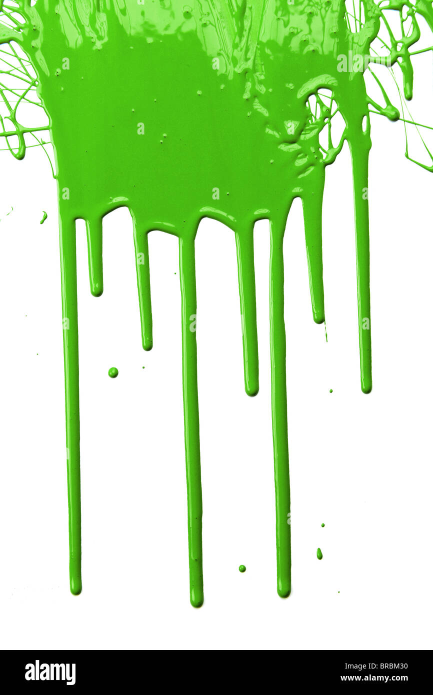 Green paint dripping isolated over white background Stock Photo