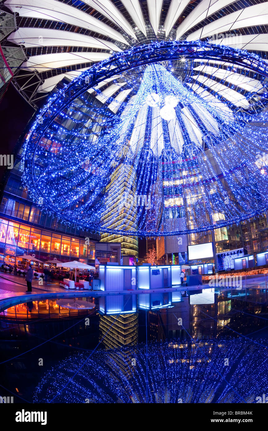 Futuristic design of the Sony Center in Potsdamer Platz, illuminated at Christmas, Berlin, Germany Stock Photo