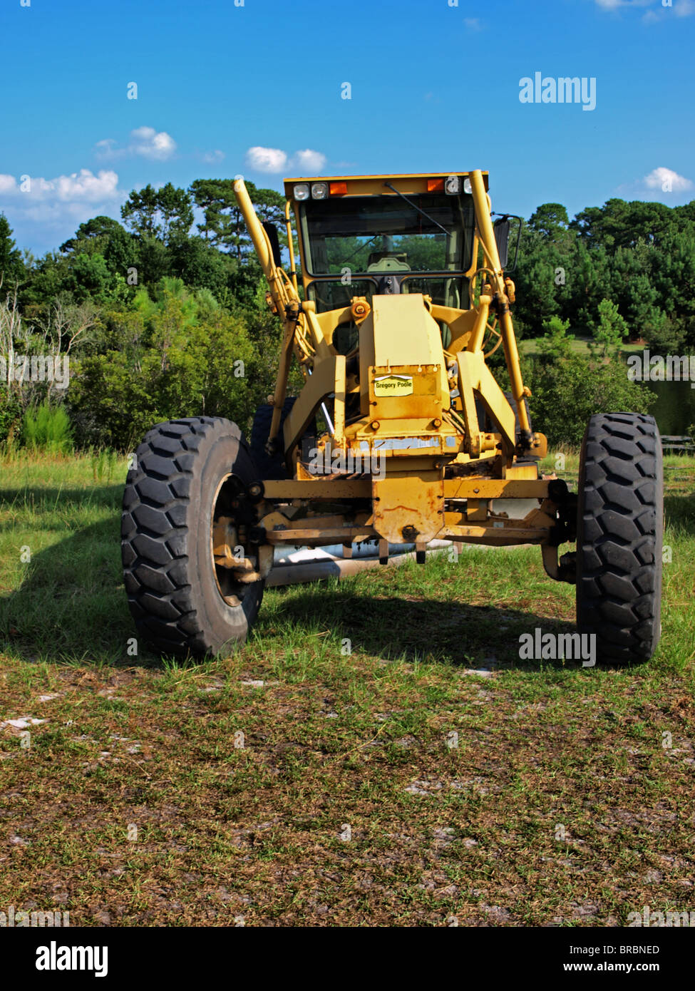 construction building equipment machinery yellow road grader shovel