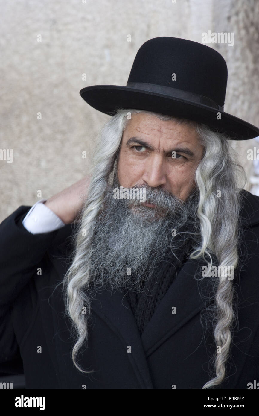 Hasidic Jew with long hair and beard, dressed in hat and typical attire, Jerusalem, Israel Stock Photo