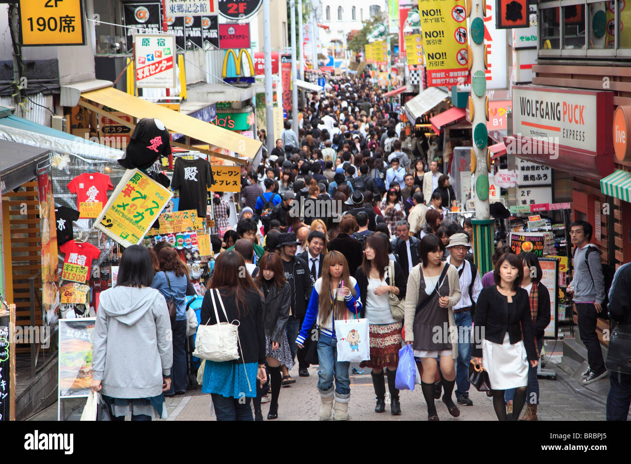 Weekend crowds, Takeshita Dori, a pedestrianised street that is a mecca for youth culture and fashion, Harajuku, Tokyo, Japan Stock Photo