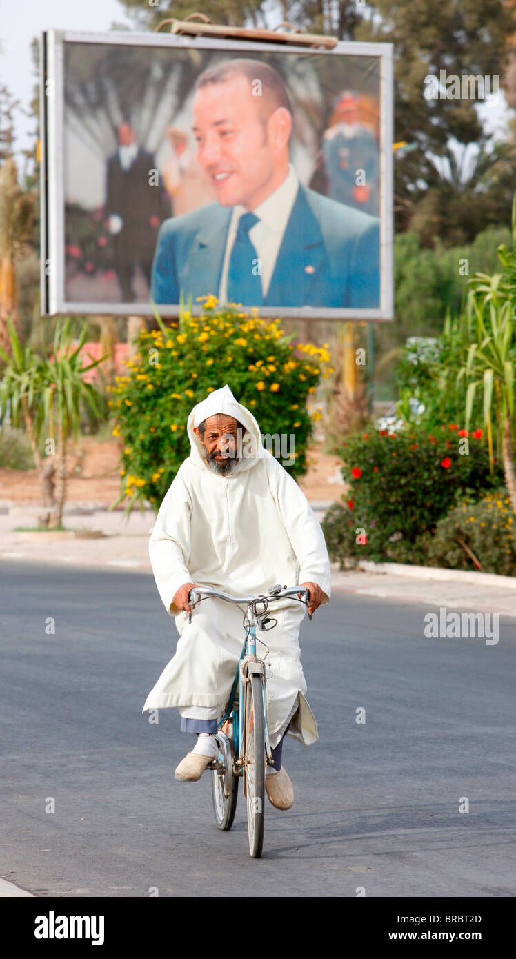Portrait of King Mohammed VI and cyclist, Taroudan, Morocco, North