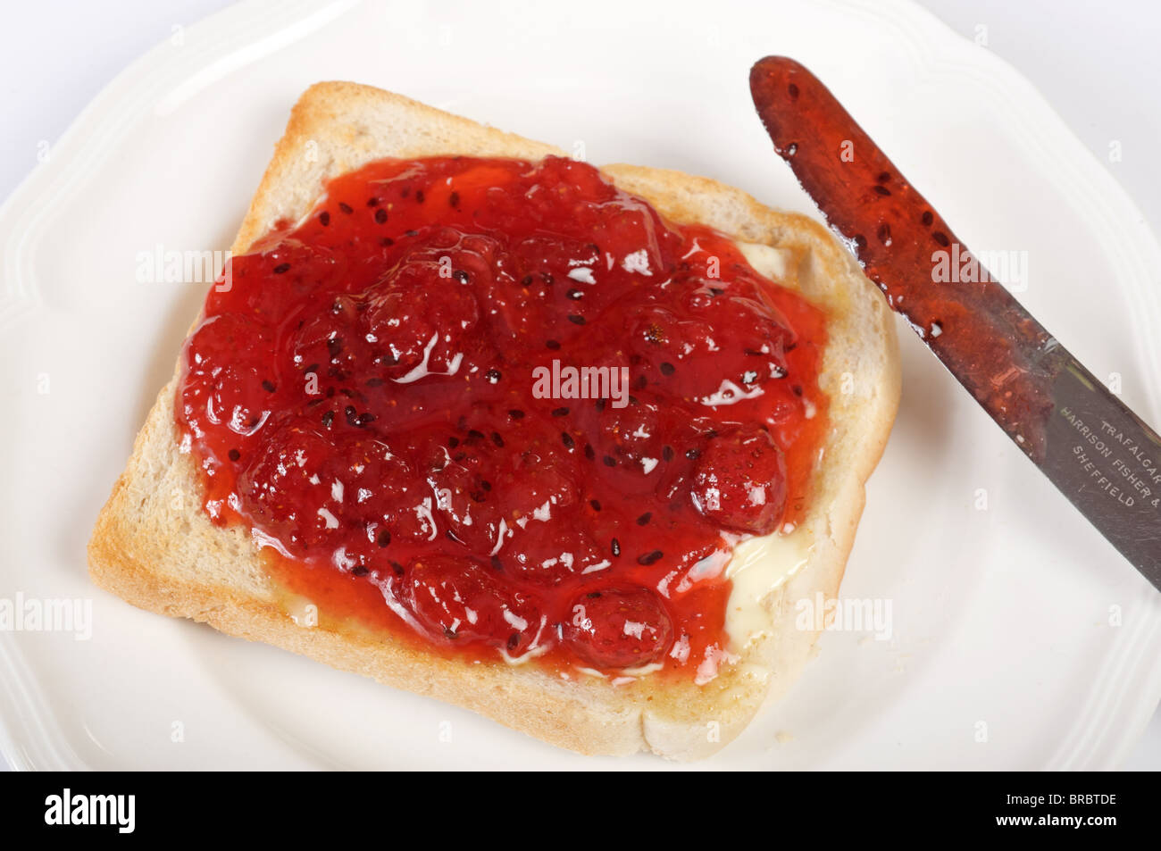 Homemade strawberry jam on toast Stock Photo Alamy