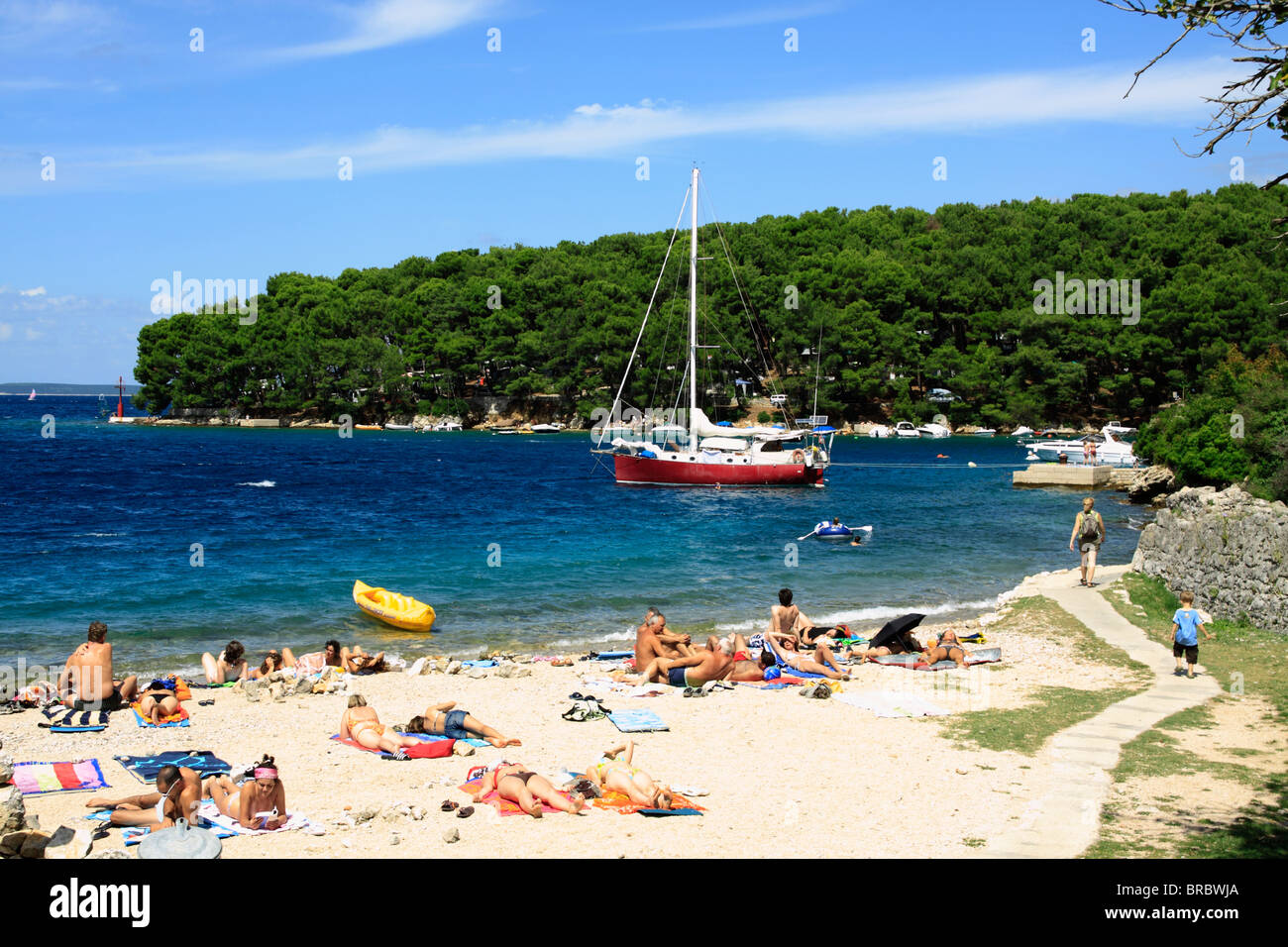 People on a beach at Bijar Bay in Osor, Cres Island, Croatia Stock ...
