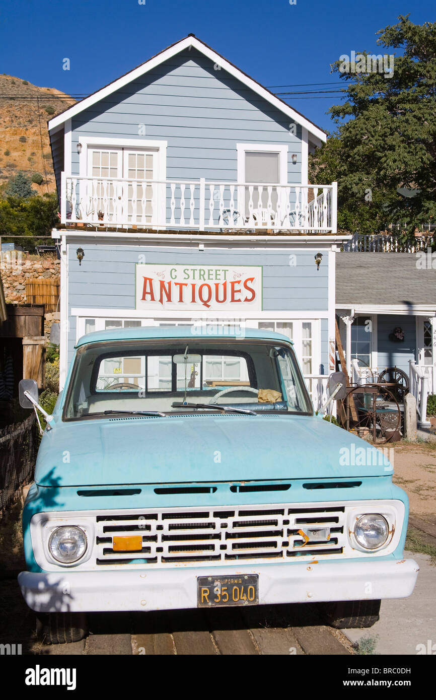 Old truck and antique store in Virginia City, Nevada, USA Stock Photo