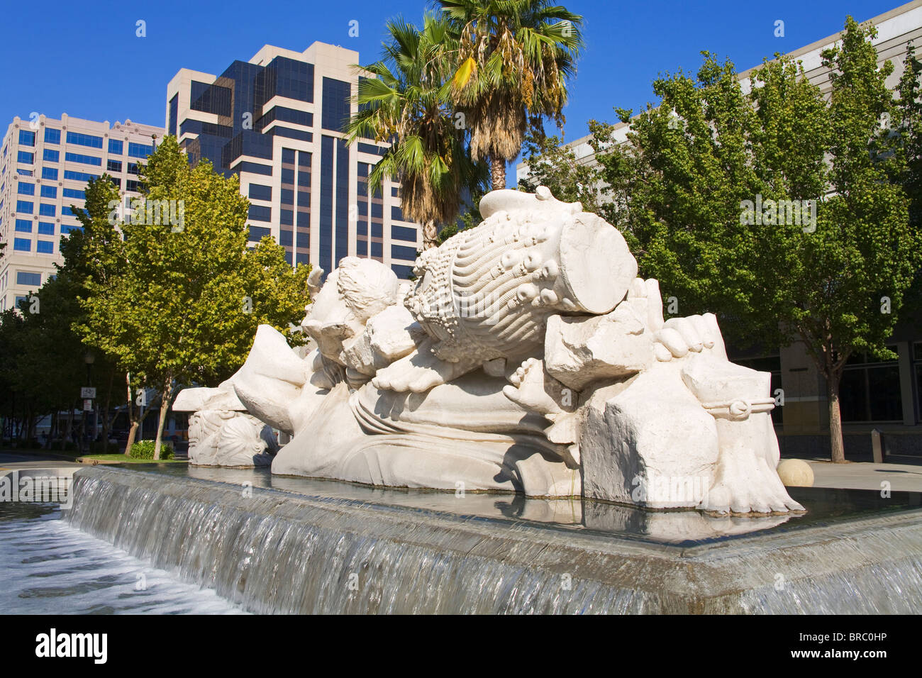 Time to Cast Away Stones, fountain sculpture  by Stephen Kaltenbach, Sacramento Convention Center, California, USA Stock Photo
