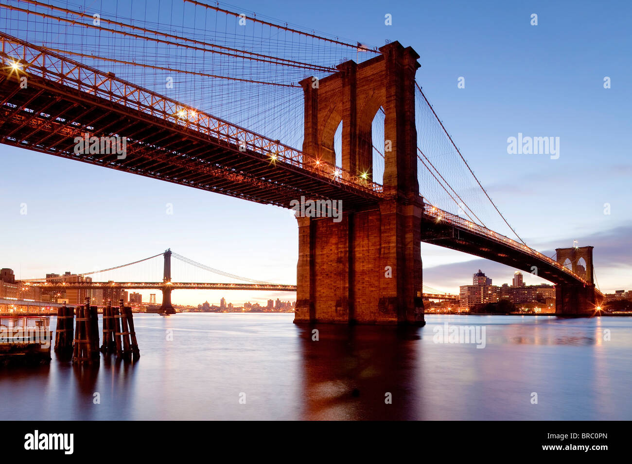 The Brooklyn Bridge spanning the East River between Brooklyn and Manhanttan, New York City, New York, USA Stock Photo