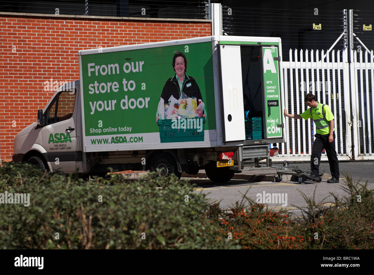 Getting the Asda van ready for home deliveries at Poole, Dorset UK in August - from our store to your door shop online today Stock Photo