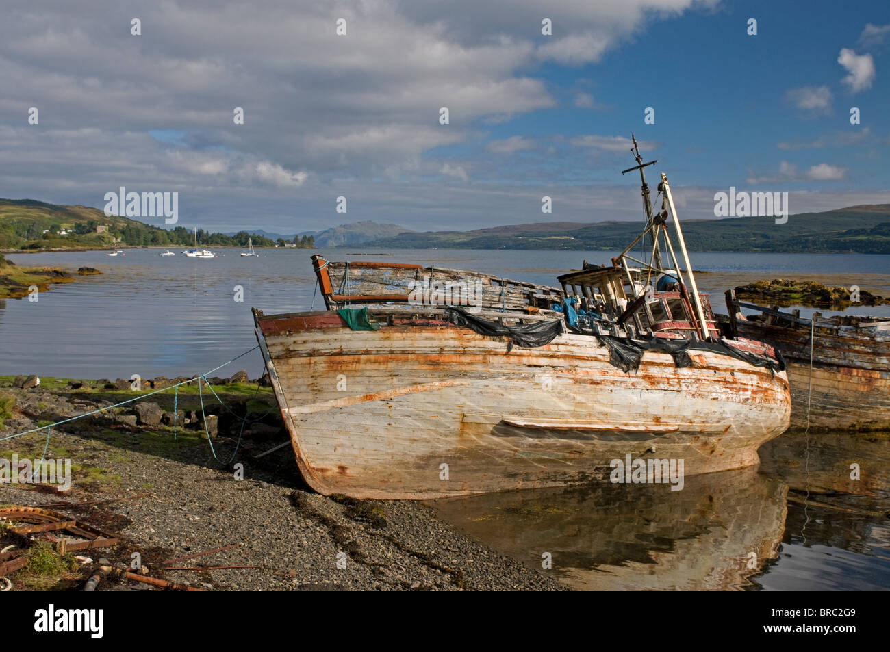 Old Boats final resting place at Salen Bay on the Isle of Mull, Inner Hebrides, Scotland.  SCO 6701 Stock Photo