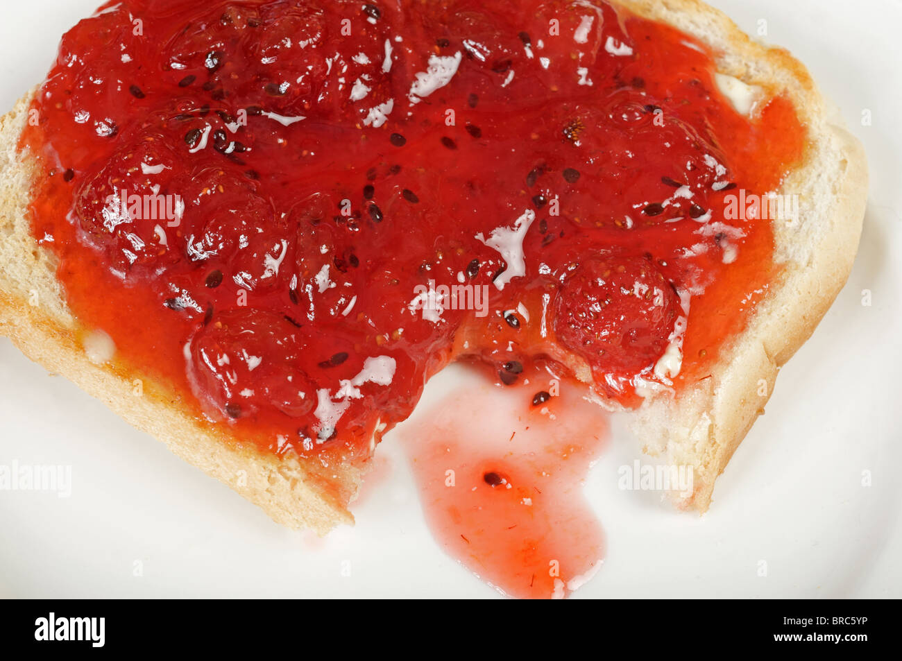 Homemade strawberry jam on toast Stock Photo Alamy