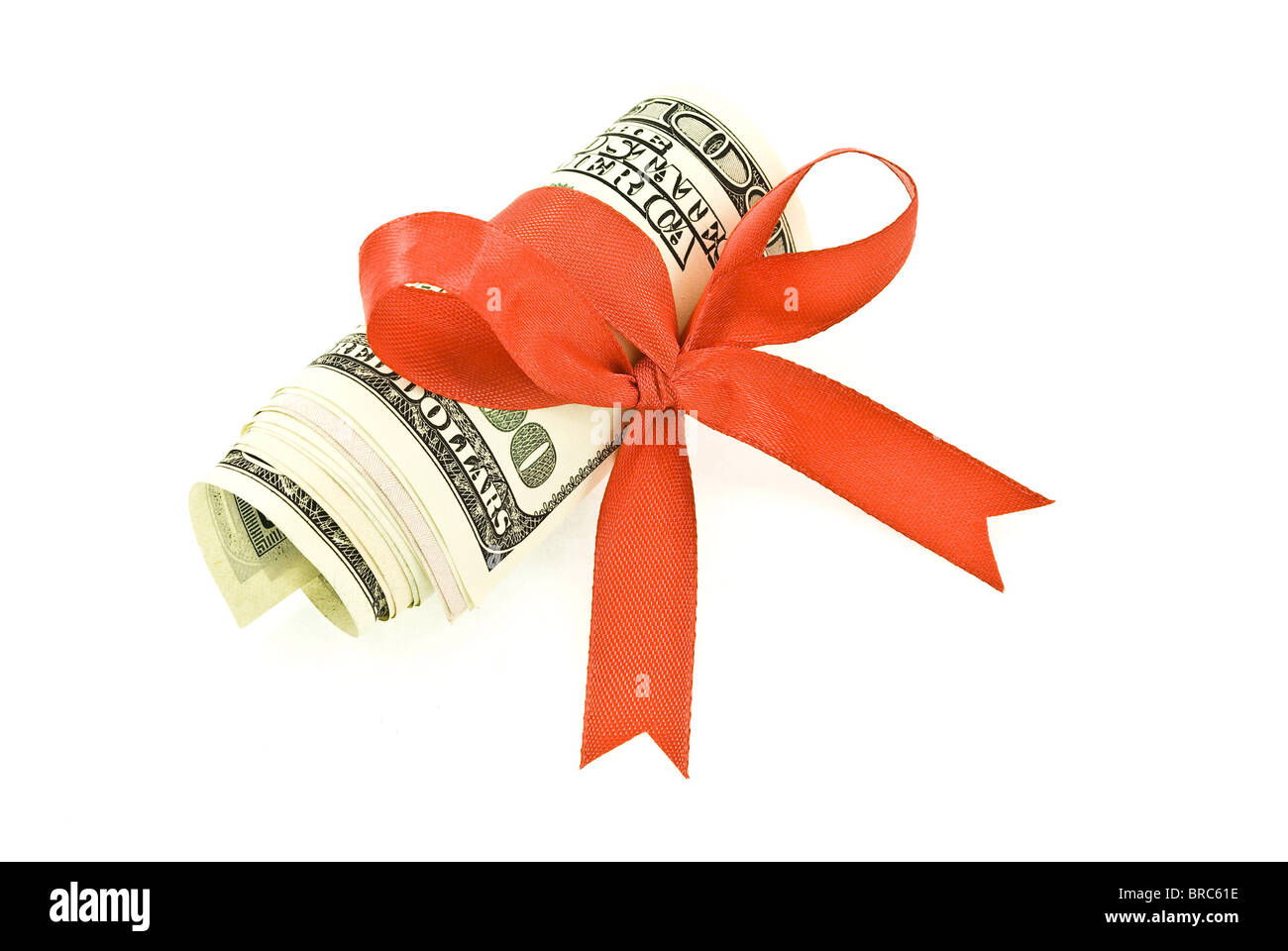 Roll of money and red bow Stock Photo