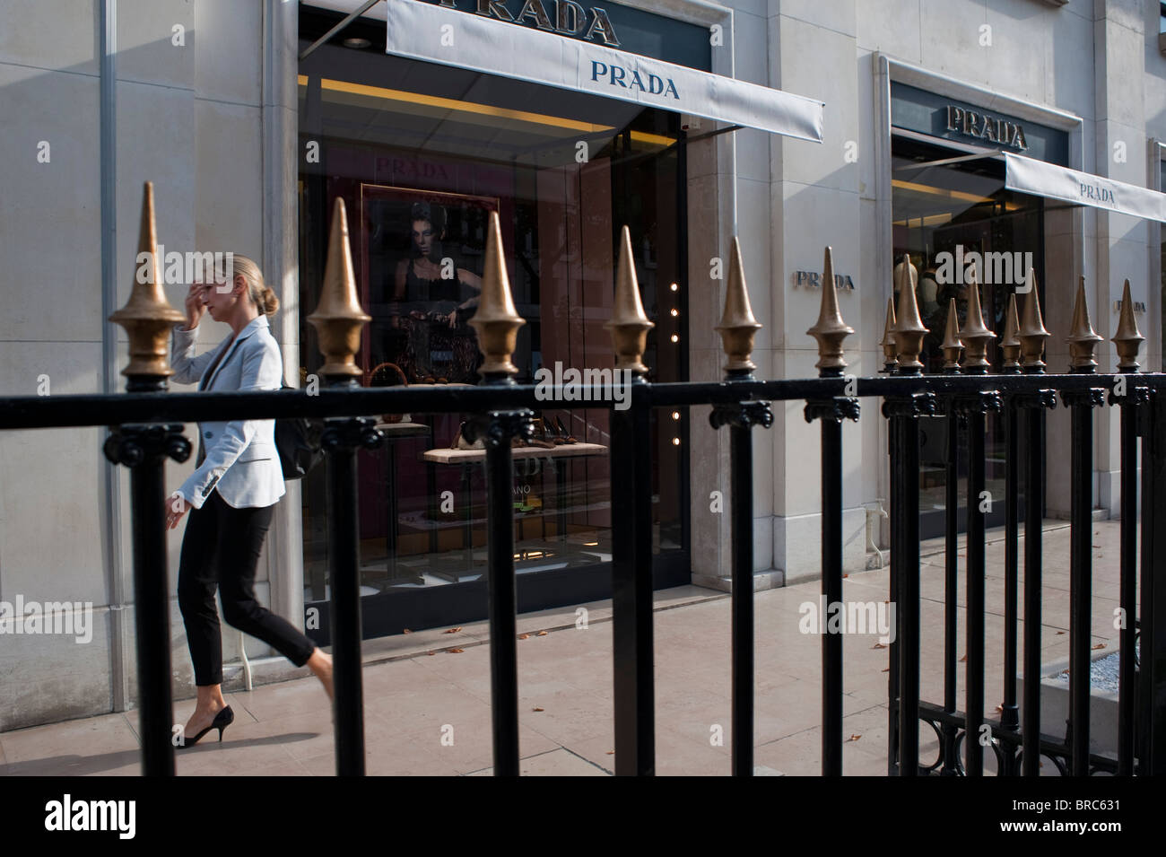 Paris, France,  Walking on Avenue Montaigne, Luxury Shopping Street, Woman Outside Prada Store, Prestige consumer Stock Photo