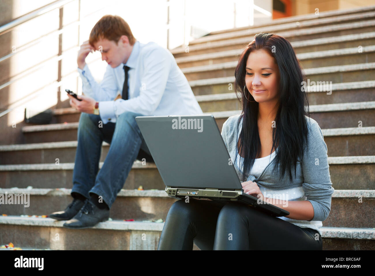 Young students on the steps. Stock Photo