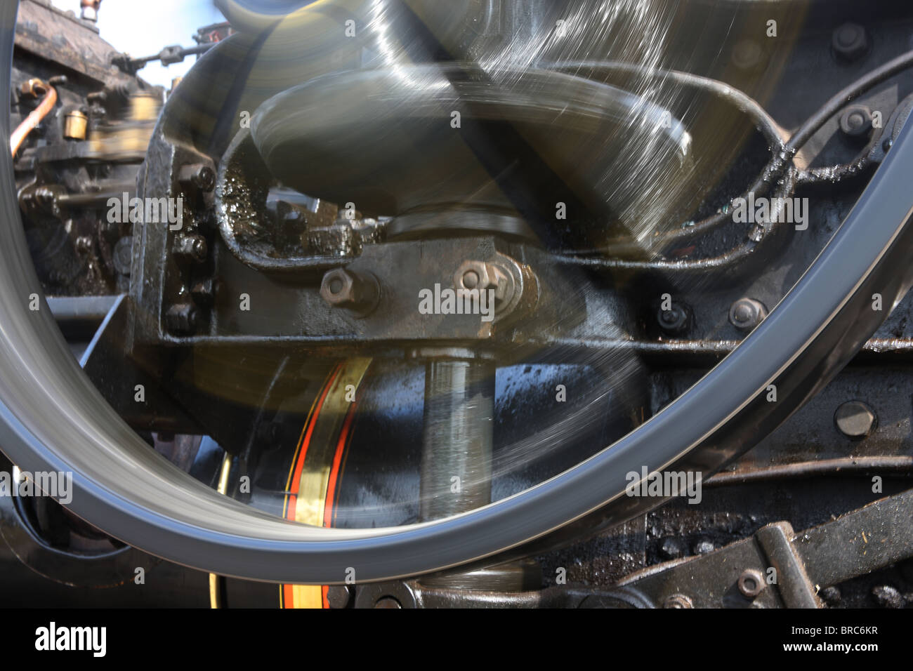 Steam engine 'flywheel in action' detail Stock Photo Alamy