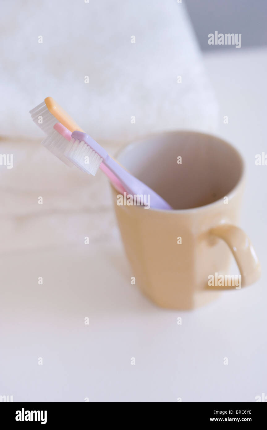 Toothbrush in a mug Stock Photo