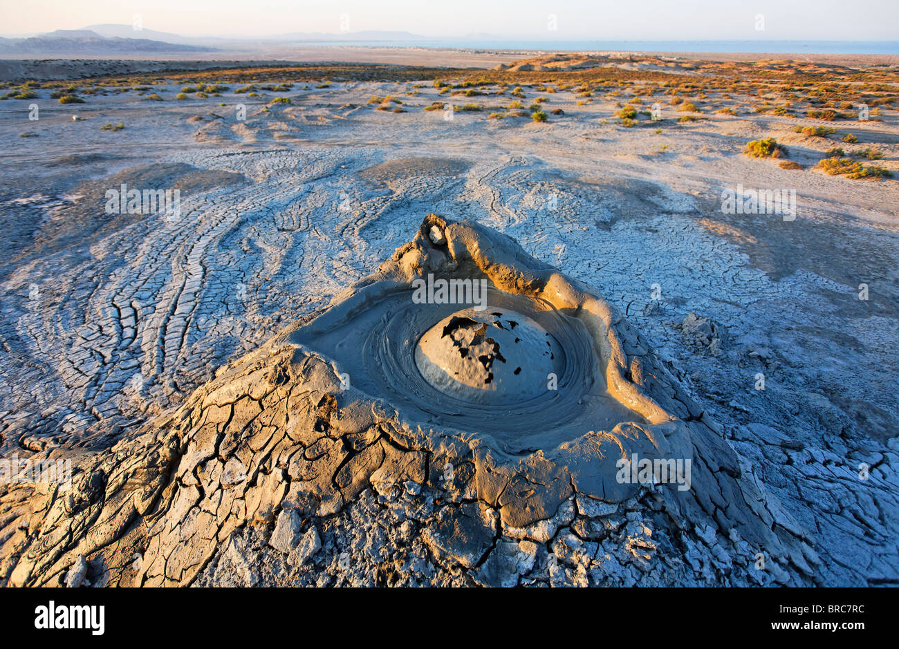 Mud erupting from a mud volcano, Qobustan, Azerbaijan Stock Photo