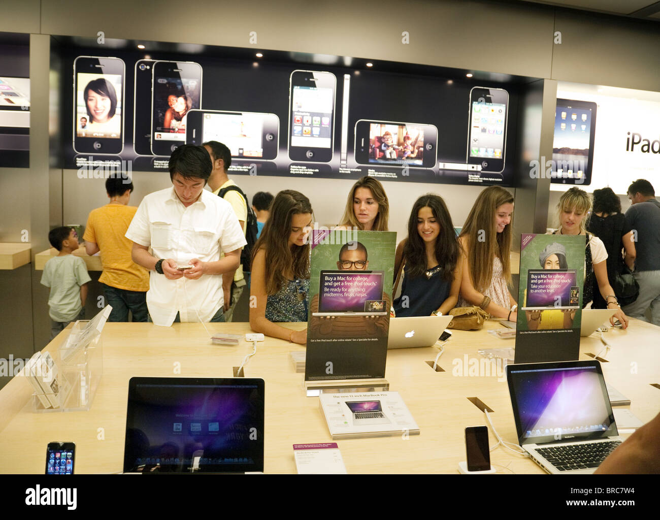 A Customer at an Apple Store Looking at His IPhone while Waiting at an Apple  Store Editorial Photo - Image of imac, computer: 237668441