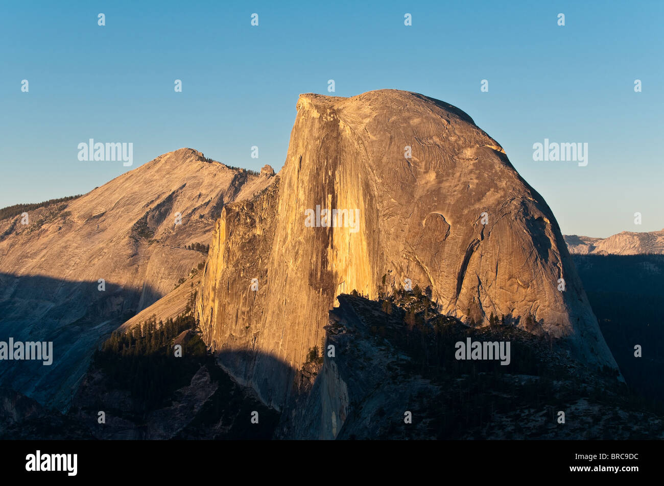 Half Dome Mountain at sunset seen from Glacier Point, Yosemite National Park, California, USA Stock Photo