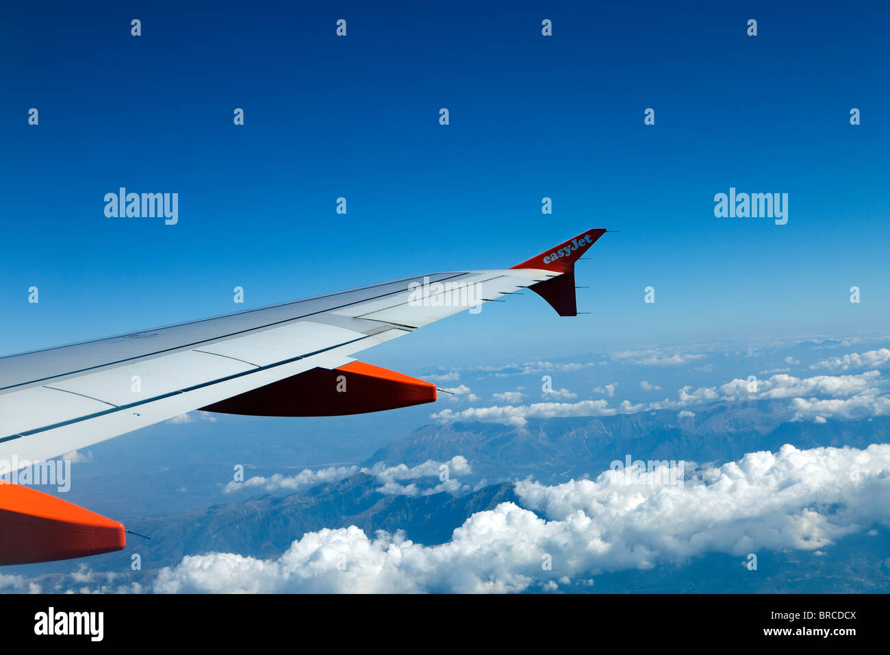 Wing of EasyJet aircarft during flight Stock Photo