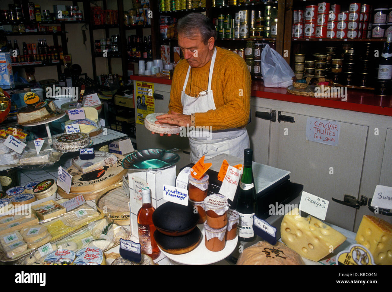 1, one, Frenchman, French man, cheese vendor, selling cheese, market, French Basque country, capital city, Bayonne, France, Europe Stock Photo