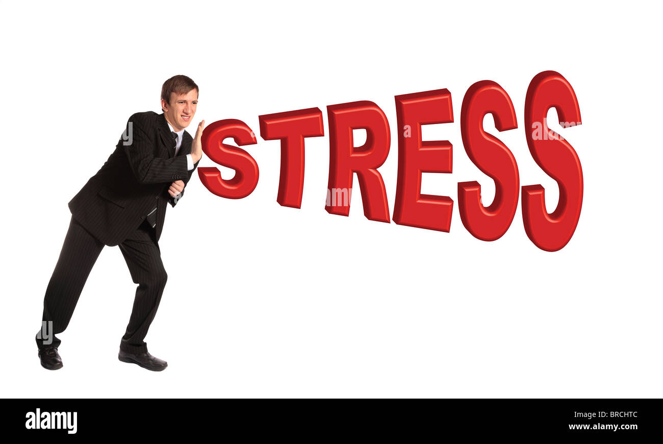 A young businessman braces himself against the word stress. All isolated on white background. Stock Photo