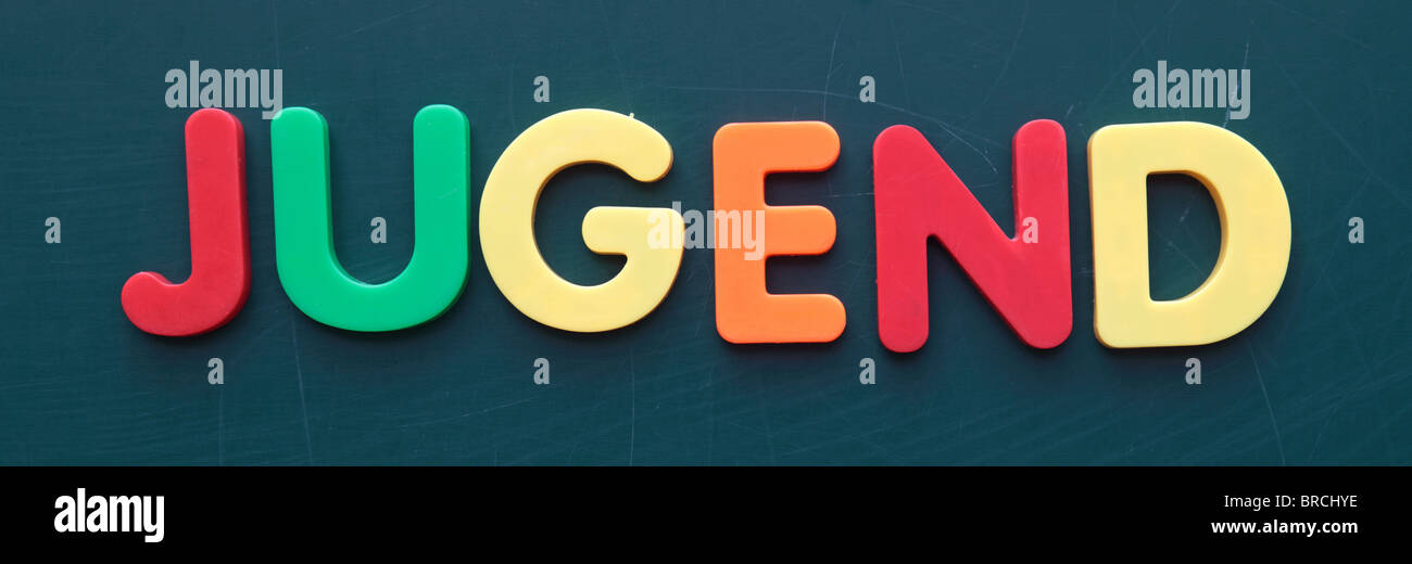 German term for youth in colorful letters on a blackboard. Stock Photo