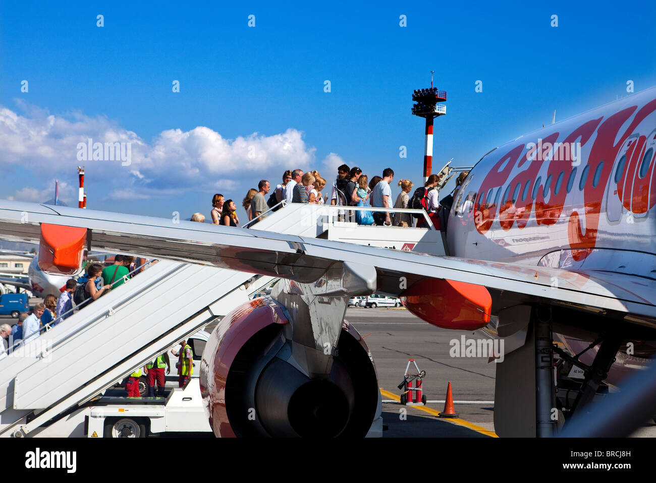 Passengers board an EasyJet flight at Corfu airport Stock Photo Alamy