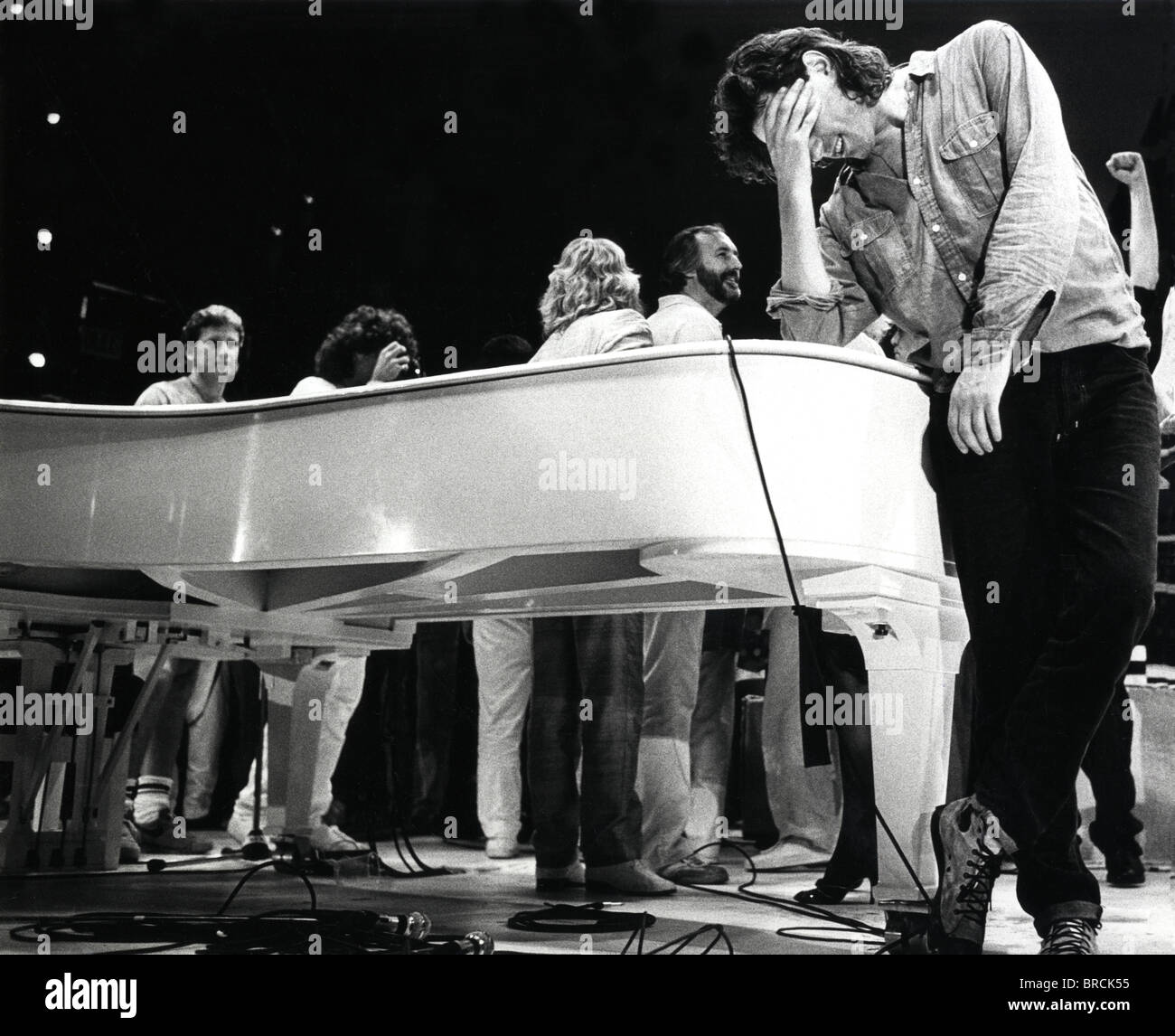 Bob Geldof in the final moments of Live Aid onstage at Wembley Stadium, relieved the massive event is over Stock Photo