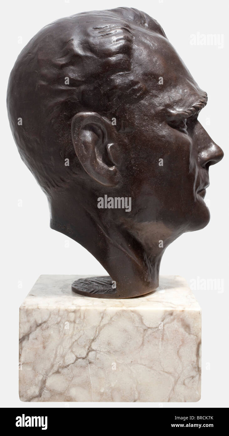 Josef Thorak (1889 - 1952), a life size bronze bust of Rudolf Heß Bronze with beautiful dark brown patina. Signed in the nape 'Thorak', with foundry mark 'Guss Brandstetter München'. Height 36 cm. On a light marble base, total height 47.5 cm. Created between 1935 and 1940. Josef Thorak was next to Arno Breker the most important sculptor of the Third Reich. Before the war, Hitler had built for him a vast studio in Baldham near Munich according to design specifications by Albert Speer. It was at that time the largest art studio in Europe - spacious enough for Tho, Stock Photo