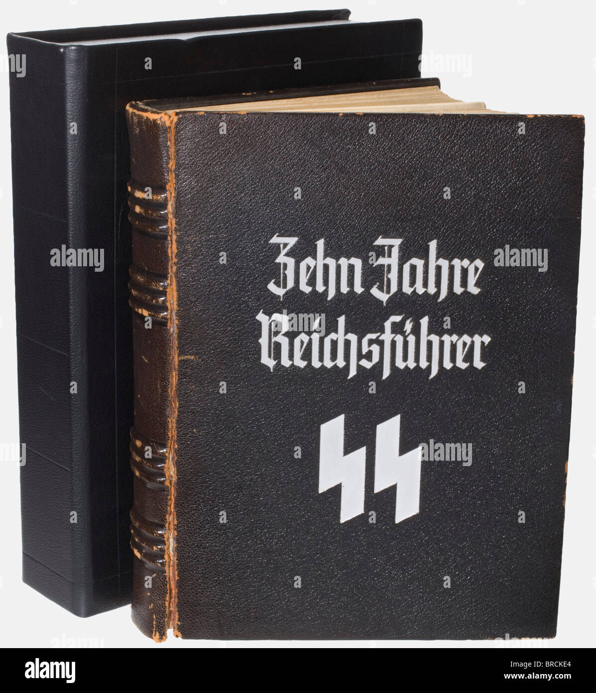 Heinrich Himmler, a presentation volume '10 Jahre Reichsführer SS' (10 Years as Reichsführer SS) Black leather binding stamped with the corresponding title in silver, and with 168 pages containing the personal memoires of various SS-leaders on the founding period of the SS and their first meetings with Himmler. Each text is individually designed, whether hand written, done in calligraphy, or typed, with colour illustrations and paste historic, historical, 1930s, 1930s, 20th century, Waffen-SS, armed division of the SS, armed service, armed services, NS, Nationa, Stock Photo