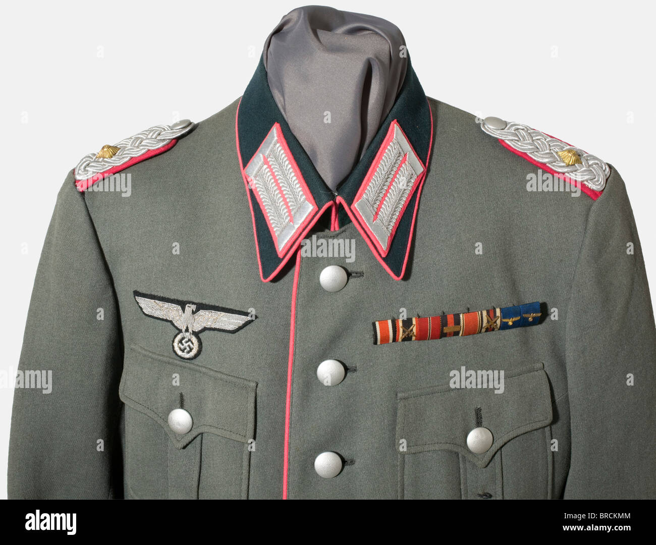 A uniform for an Oberstleutnant (Lt. Colonel), on the general staff A field  grey wool felt service cap with dark green cap band, scarlet red piping,  silver-embroidered insignia (resewn) and silver cap