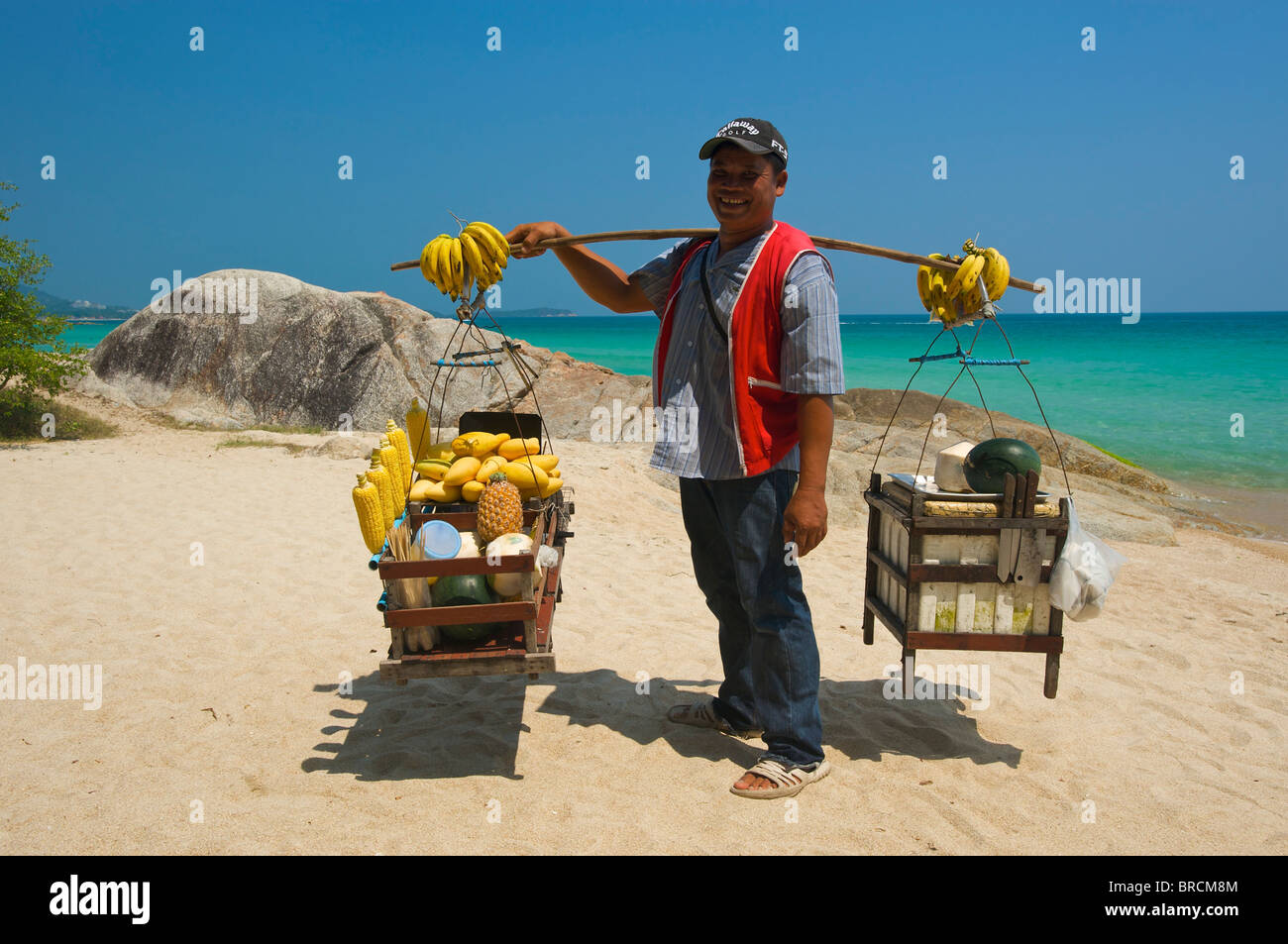 Salesman at Chaweng Beach, Ko Samui Island, Thailand Stock Photo