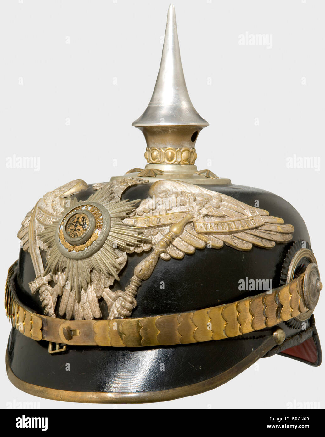 A helmet for Prussian officers, of the Guard Infantry or Pioneers Fibre body with silver-coloured fittings. Guard eagle with the partially enamelled Star of the Order of the Black Eagle. Chinscales and star screws of tombac, officer's cockades. Spike not silvered (renewed?), silk liner renewed, silver-plating rubbed. As worn by the Guard Fusilier Regiment, the 5th Foot Guard Regiment, the Guard Pioneer Battalion and Railroad Regiments 1 - 3. historic, historical, 19th century, Prussian, Prussia, German, Germany, militaria, military, object, objects, stills, cli, Stock Photo