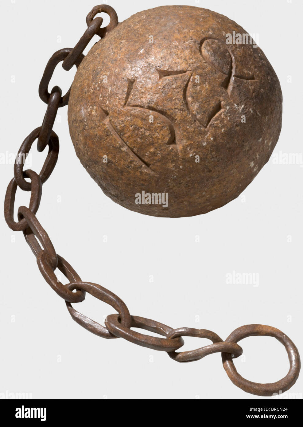 A German ball and chain, dated 1524 Ball of granite with engraved date '1524' and heavy, inset iron chain. Chain links with visible traces of wear. Weight 24.5 kg. historic, historical, 16th century, instrument of torture, torture device, instruments of torture, torture devices, object, objects, stills, clipping, clippings, cut out, cut-out, cut-outs, Stock Photo