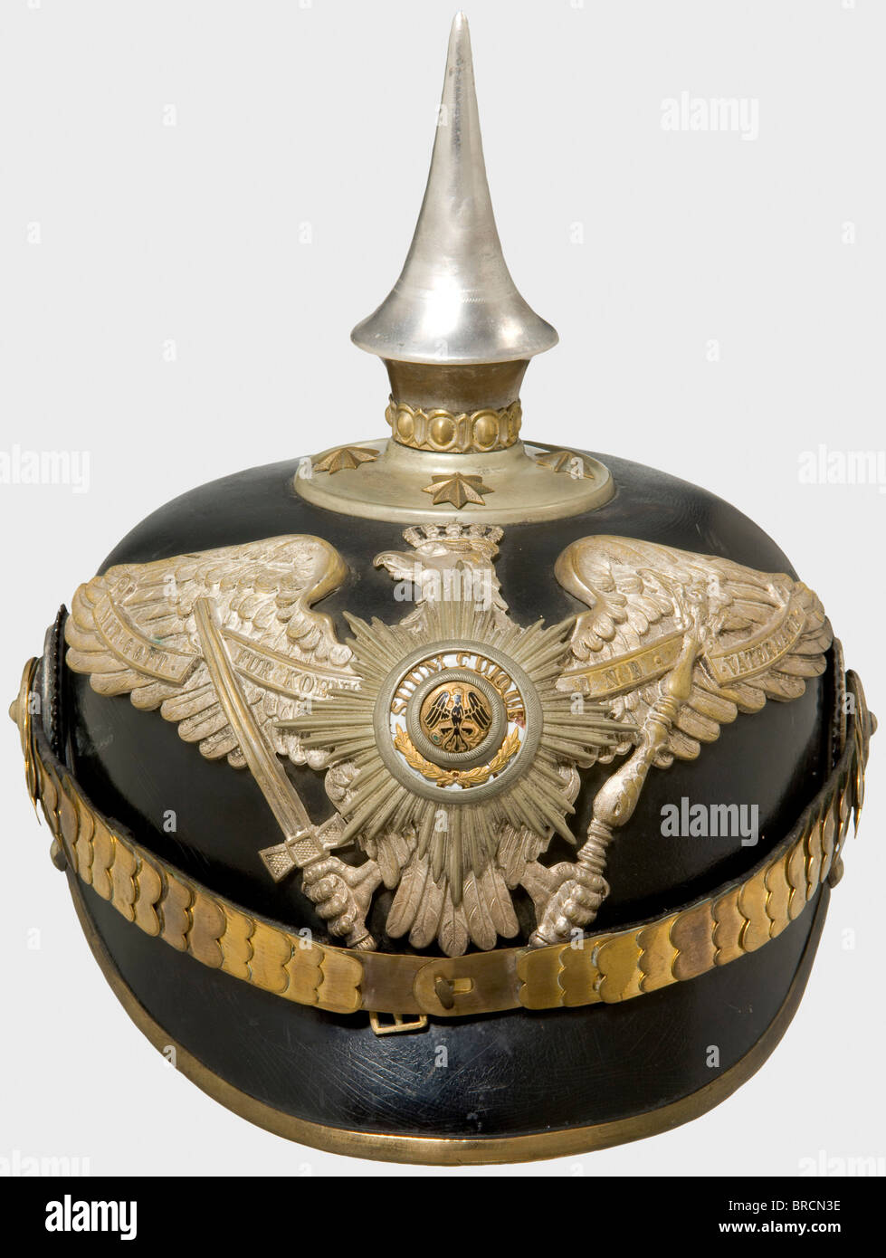 A helmet for Prussian officers, of the Guard Infantry or Pioneers Fibre body with silver-coloured fittings. Guard eagle with the partially enamelled Star of the Order of the Black Eagle. Chinscales and star screws of tombac, officer's cockades. Spike not silvered (renewed?), silk liner renewed, silver-plating rubbed. As worn by the Guard Fusilier Regiment, the 5th Foot Guard Regiment, the Guard Pioneer Battalion and Railroad Regiments 1 - 3. historic, historical, 19th century, Prussian, Prussia, German, Germany, militaria, military, object, objects, stills, cli, Stock Photo