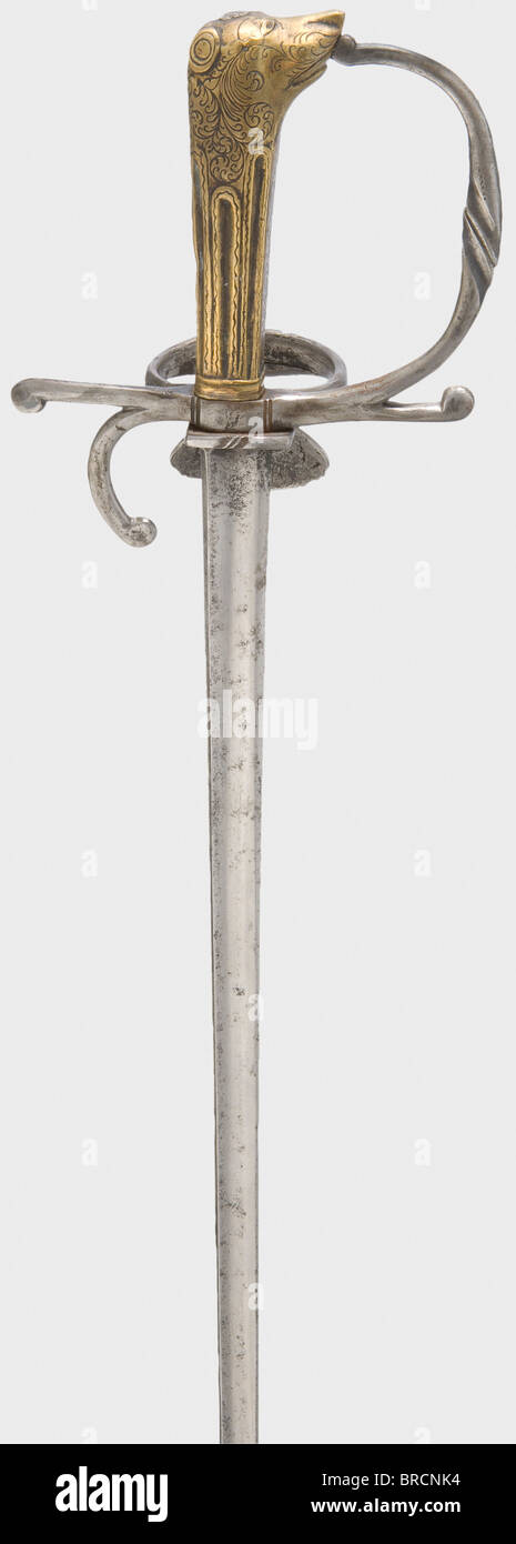 A German hunting small-sword, circa 1650 Slender thrusting blade with a ridged back. Chiselled iron knuckle-bow hilt with shell-shaped guard. Floral engraved brass grip with pommel in the shape of a hound's head. Length 80 cm. historic, historical,, 17th century, double-edged hunting knife, thrusting, thrustings, weapon, arms, weapons, arms, fighting device, object, objects, stills, clipping, clippings, cut out, cut-out, cut-outs, Stock Photo