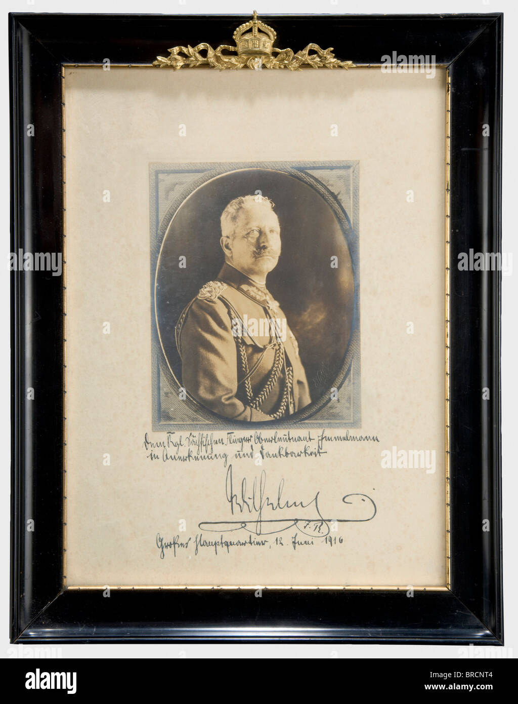 Oberleutnant Max Immelmann (1890 - 1916), an inscribed photograph of Kaiser Wilhelm II, 1916 An oval portrait of the Kaiser in field marshal's uniform. Photographer Voigt. With mount (slightly stained) with an ink dedication by the Kaiser, 'Dem Kgl. Sächsischen Flieger Oberleutnant Immelmann in Anerkennung und Dankbarkeit - Wilhelm I.R. - Großes Hauptquartier, 12 Juni 1916'. (To the Royal Saxon Pilot First Lieutenant Immelmann in Recognition and Gratitude - Wilhelm I.R. - Supreme Headquarters, 12 June 1916). Privately framed and under glass by Max Immelmann's b, Stock Photo