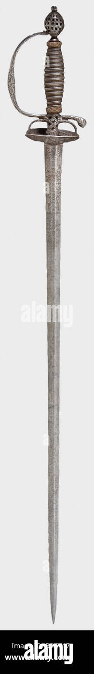 A French small-sword with chiselled hilt, circa 1780 Double-edged blade of flattened diamond section and a French inscription amid ornamental etching. Pierced, chiselled hilt with iron grip cover and copper Turk's heads. Length 90 cm. historic, historical, 18th century, dress sword, swords, thrusting, thrustings, smallsword, epee de cour, weapon, arms, weapons, arms, military, militaria, object, objects, stills, clipping, clippings, cut out, cut-out, cut-outs, Stock Photo