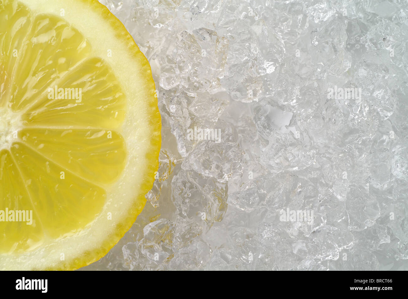Lemon slice on crushed ice Stock Photo