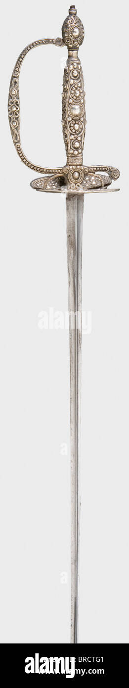 A French silver-hilted small-sword, circa 1790 Smooth, slender triangular blade. Silver hilt cut in a lozenge pattern with vine decoration and several silver hallmarks on the grip and finger loop. Length 99.5 cm. historic, historical, 18th century, dress sword, swords, thrusting, thrustings, smallsword, epee de cour, weapon, arms, weapons, arms, military, militaria, object, objects, stills, clipping, clippings, cut out, cut-out, cut-outs, Stock Photo