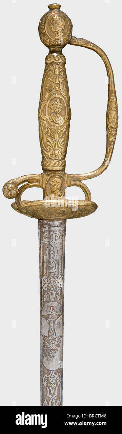 A French small-sword, circa 1740 A double-edged thrusting blade of flattened hexagonal section and well preserved etching on both sides of the forte. An all-brass hilt chiselled in relief with cartouches amid geniis. Length 90 cm. Well-preserved, elegant sword. historic, historical, 18th century, dress sword, swords, thrusting, thrustings, smallsword, epee de cour, weapon, arms, weapons, arms, military, militaria, object, objects, stills, clipping, clippings, cut out, cut-out, cut-outs, Stock Photo